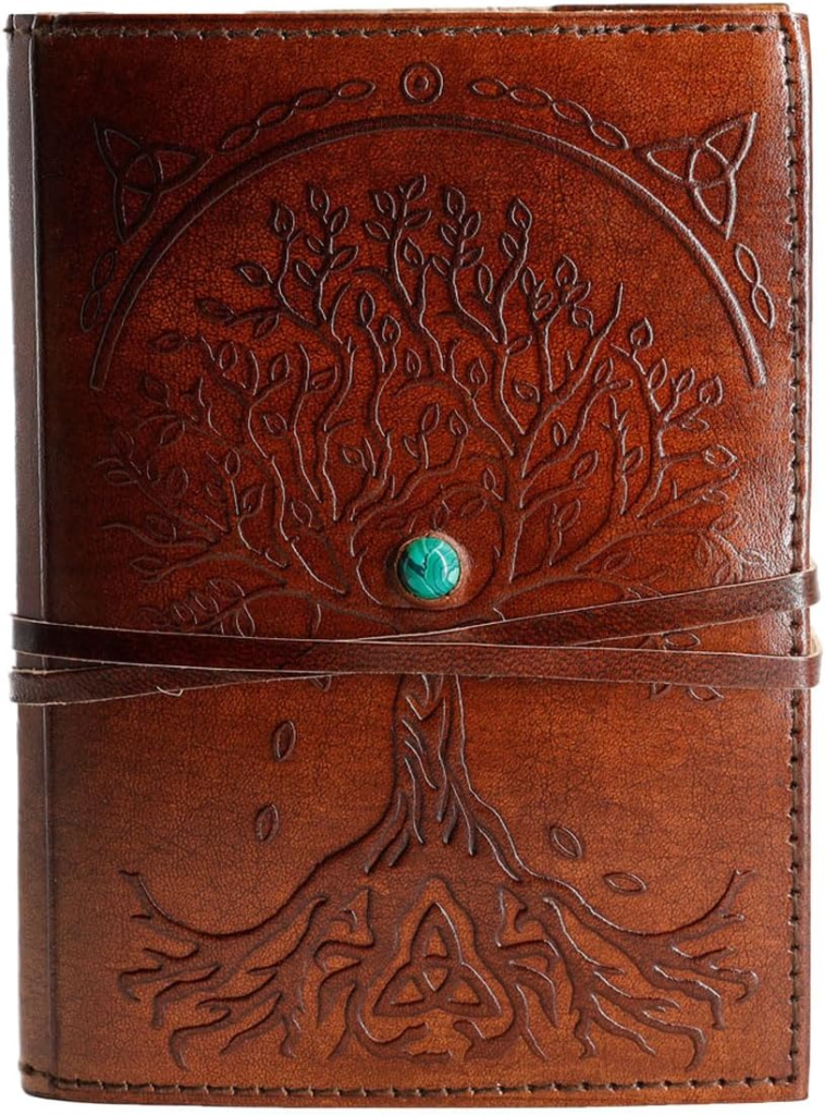 Leather-bound spiritual journal for self-reflection.